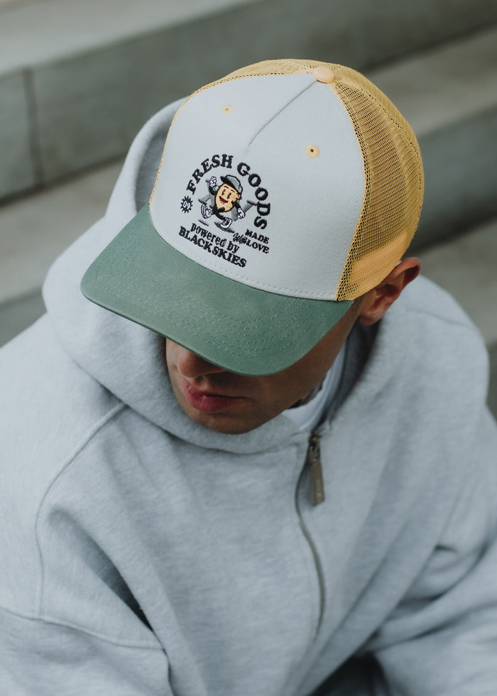 Blackskies-15th-Anniversary-Trucker-Cap-Lemon-Model