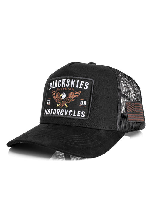 Black trucker cap with 'Blackskies Motorcycles' patch on a white background