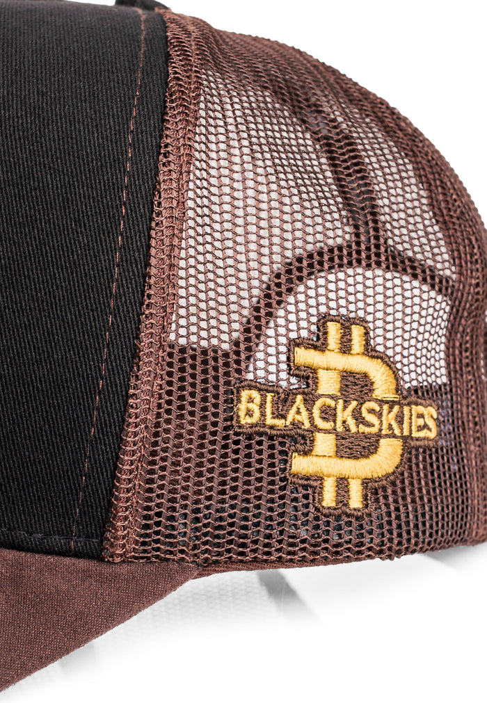 Brown and black cap with 'Blackskies' logo on a white background