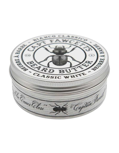 Close-up of Bianco Classico Beard Butter tin with beetle logo, black and white design