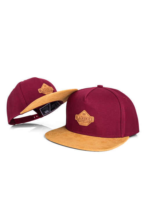Maroon and yellow cap with a brand logo on a white background