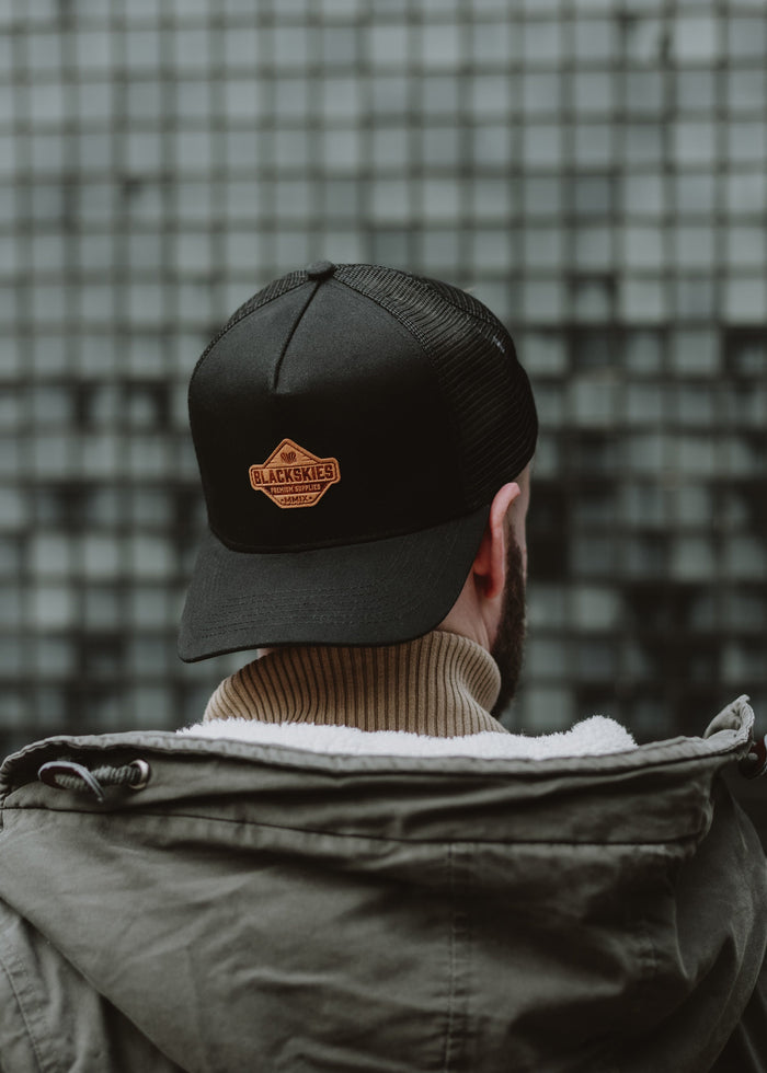 Blackskies-Essentials-Trucker-Cap-Black-Black-Brown-Model-2