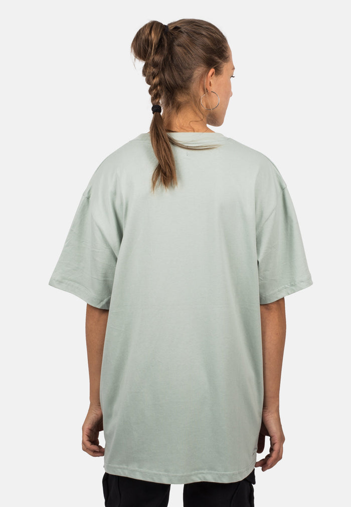 Blackskies-Unisex-Oversized-T-Shirt-Sage-Female-Model-Back