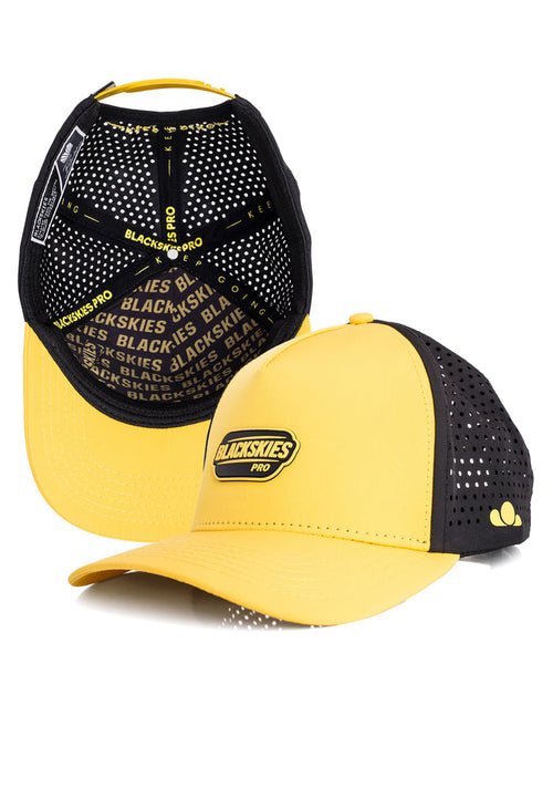 Yellow and black cap with 'Blackskies' branding on a white background