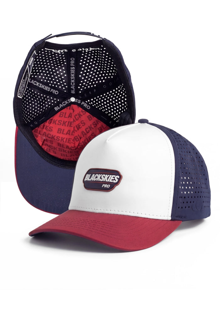 Two baseball caps with 'Blackskies Pro' branding on a white background