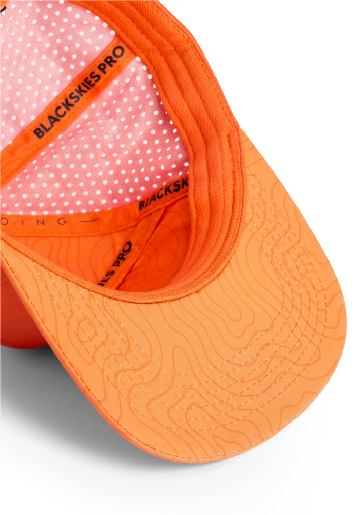 Orange cap with black text on a white background