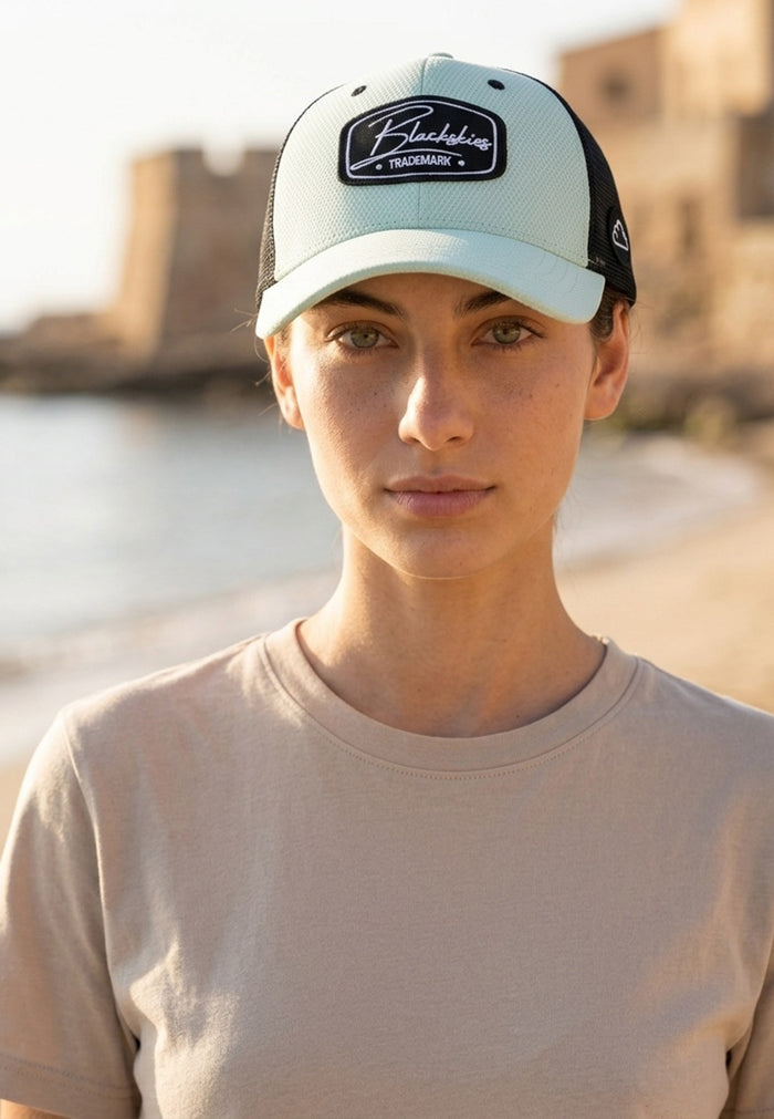 Person wearing a cap with a blurred background