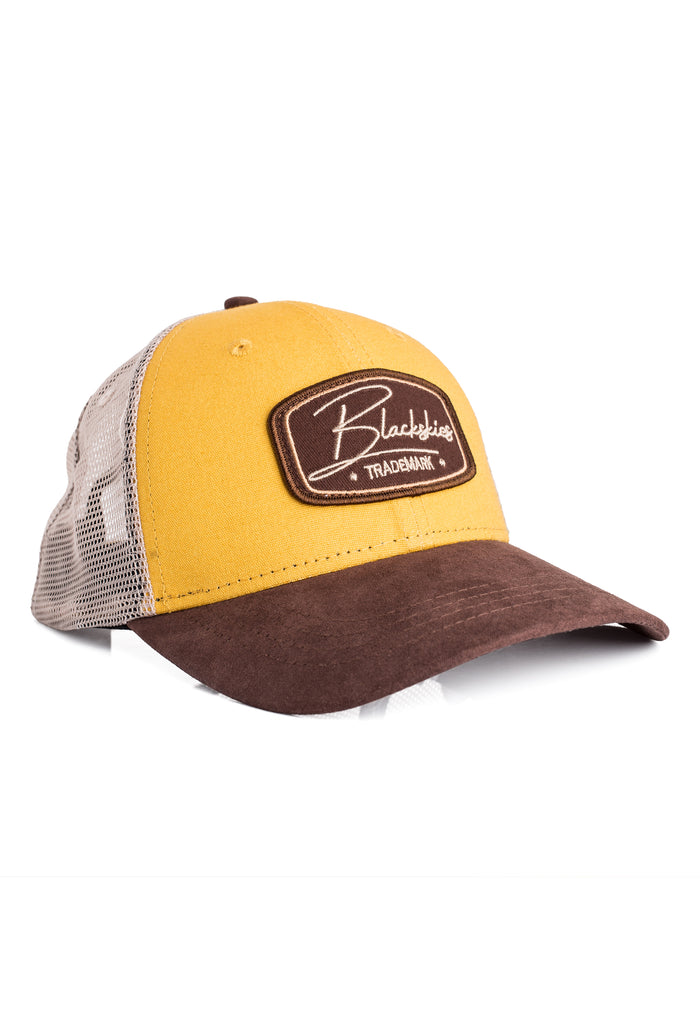 Yellow and brown cap with a logo on a white background