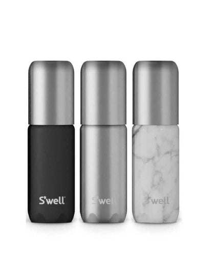 Close-up of three aluminum travel bottles in black, silver, and marble white with silver caps, designed for toiletries and liquids