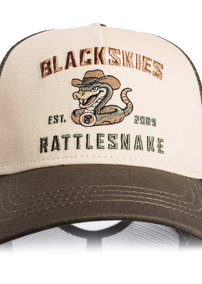 Beige and brown cap with 'Blackskies Rattlesnake' logo and text on a white background